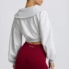 Kort sweatshirt med kvart glidelås i grå melert