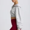Kort sweatshirt med kvart glidelås i grå melert
