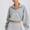Kort sweatshirt med kvart glidelås i grå melert