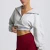 Kort sweatshirt med kvart glidelås i grå melert