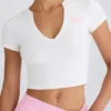 Kort T-skjorte i stretch-bomullsjersey med grafisk trykk i hvit