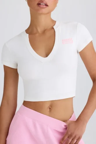 Kort T-skjorte i stretch-bomullsjersey med grafisk trykk i hvit