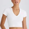 Kort T-skjorte i stretch-bomullsjersey med grafisk trykk i hvit
