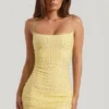 Lunetta pyntet bodycon-minikjole med rund hals i gult