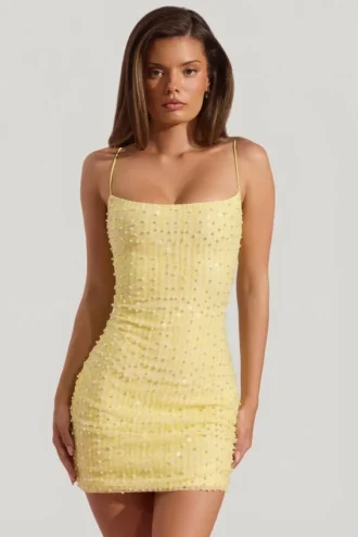 Lunetta pyntet bodycon-minikjole med rund hals i gult