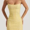 Lunetta pyntet bodycon-minikjole med rund hals i gult