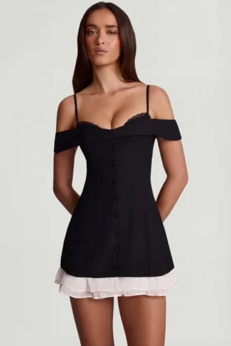 Maelie Off-Shoulder Ruffle A-Line minikjole i svart