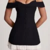 Maelie Off-Shoulder Ruffle A-Line minikjole i svart