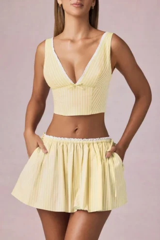 Magda crop-top med sløyfedetaljer i sitrongule striper
