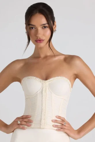 Melvina Ruched Lace-Up Strapless Corset Top i elfenben