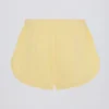 Mid-Rise Shorts med knapper i sitron
