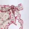 Molinas sarong med snøring i siden i rødt blomstermønster