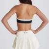 Myk, aktiv tennis-skort med lav midje og plissering i elfenben
