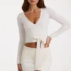 Myk strikket wrap-top i elfenben