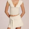 Evelique mid-rise skort i elfenben