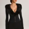 Nesta korsett-playsuit med fuskepelskant i svart