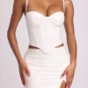 Cassandra vinyl-korsett-crop-top med bøyle i hvitt