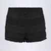 Orla shorts med volanger og middels høy midje i svart