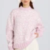 Oversized genser i rosa med jacquardmønster