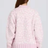 Oversized genser i rosa med jacquardmønster