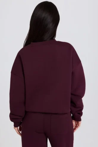 Oversized genser med rund hals i burgunder