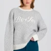 Oversized genser med strikket logo i Ice
