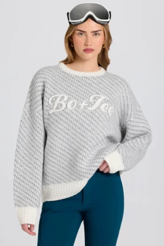 Oversized genser med strikket logo i Ice