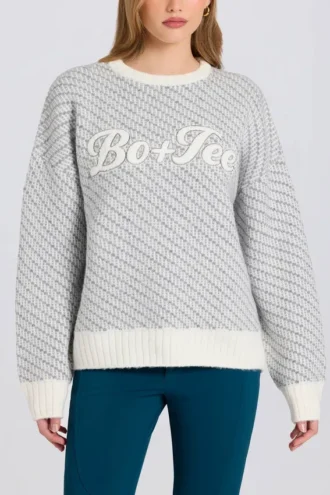 Oversized genser med strikket logo i Ice