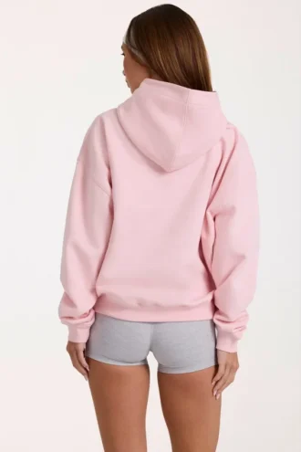 Oversized hettegenser med applikasjon i Blush