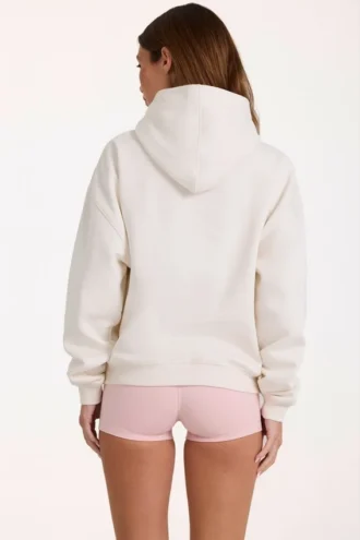 Oversized hettegenser med applikasjon i elfenben
