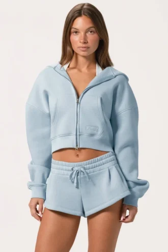 Oversized hettegenser med glidelås  i Powder Blue