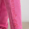 Oversized joggebukse i børstet jersey i hot pink
