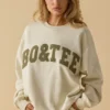 Oversized sweatshirt med rund hals i benhvit