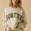 Oversized sweatshirt med rund hals i benhvit