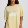 Oversized T-skjorte med grafisk trykk i sitron