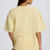 Oversized T-skjorte med grafisk trykk i sitron