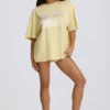 Oversized T-skjorte med grafisk trykk i sitron