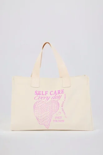 Oversized totebag i kanvas i fargen Egg Shell