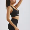 Plunge Neck Define Luxe Sports Bra i svart