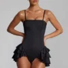 Priaska korsett-playsuit med volanger og snøring i svart