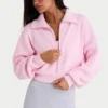 Ribbestrikket, kort sweatshirt med glidelås i blekrosa