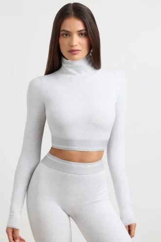 Ryggløs turtleneck-crop-top med lange ermer i grå melert