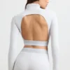 Ryggløs turtleneck-crop-top med lange ermer i grå melert