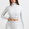 Ryggløs turtleneck-crop-top med lange ermer i grå melert