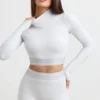 Ryggløs turtleneck-crop-top med lange ermer i grå melert