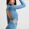 Ryggløs turtleneck-crop-top med lange ermer i stålblå