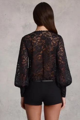 Serenya Sheer Lace Plunge-Neck Loose-Fit Playsuit i svart