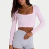 Sømløs, myk ribbet crop-top med utskjæringer i pudderrosa