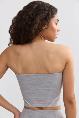 Soft Active bandeau-top med kontrastkanter i melert grå