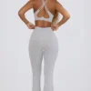 Soft Active leggings med V-formet linning, lommer og utvidet ben i grått